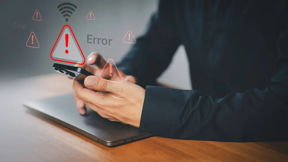 パソコンの通信エラーやネットワーク障害を表現したイメージ画像