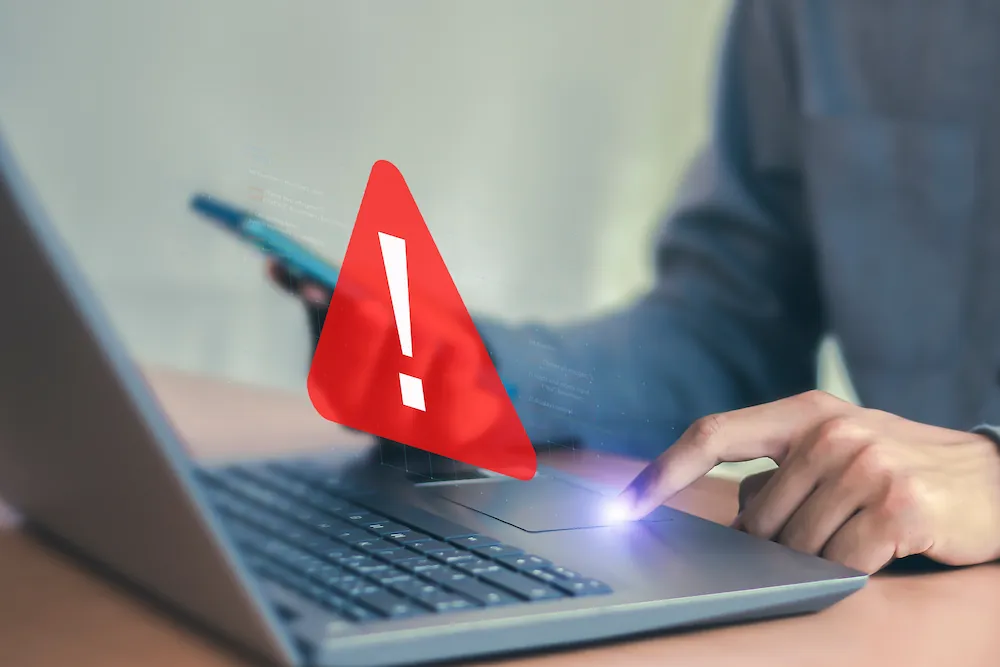 パソコンの操作中に表示された警告マークのイメージ画像